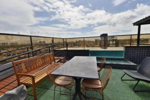 Uma varanda ou terraço em Reserva Madero Loft Natal Hotel