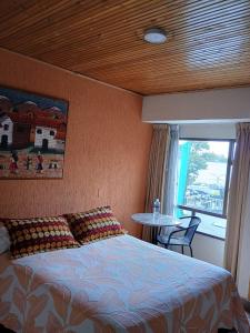 Postel nebo postele na pokoji v ubytování Hoteles Bogotá Inn Galerías