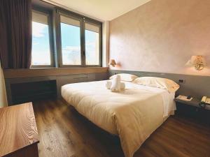 Hotel Alfieri客房内的一张或多张床位