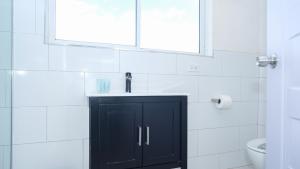 Ein Badezimmer in der Unterkunft GolfView Hotel