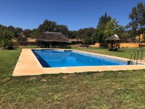 The swimming pool at or close to Cortijo Zalamea