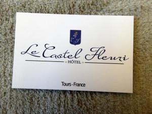a white card with the words le easel heart at Castel Fleuri in Tours