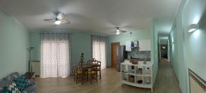 a living room with a couch and a table at Casa Dolce Casa Napoli&Amalfi&Positano 6&7 Alloggiano gratis in Trecase