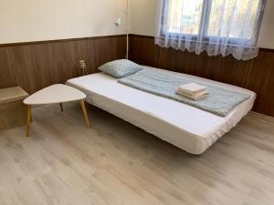 Postel nebo postele na pokoji v ubytování Chata Pod Kopcem