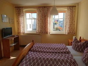 TV a/nebo společenská místnost v ubytování Alte Kaeserei Comfortable holiday residence