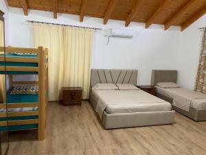 Krevet ili kreveti u jedinici u okviru objekta Benjys Vila