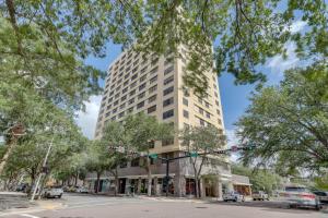 a tall building on the corner of a street at Downtown Studio with City Views in Jacksonville! in Jacksonville