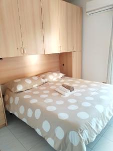 En eller flere senge i et værelse på Maremonti