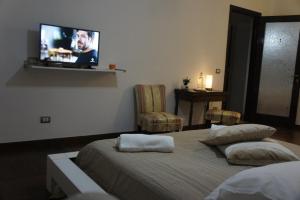 Łóżko lub łóżka w pokoju w obiekcie B&B Civico 40
