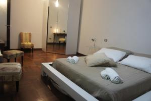 Łóżko lub łóżka w pokoju w obiekcie B&B Civico 40