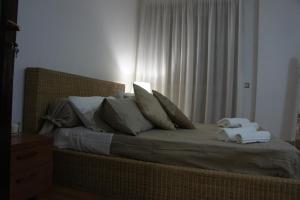 Łóżko lub łóżka w pokoju w obiekcie B&B Civico 40