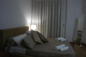 Łóżko lub łóżka w pokoju w obiekcie B&B Civico 40