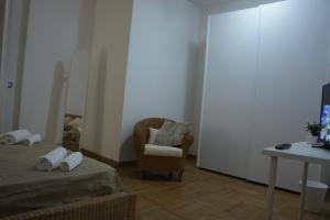 Łóżko lub łóżka w pokoju w obiekcie B&B Civico 40