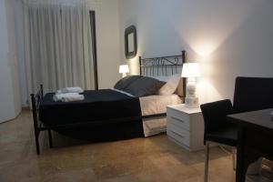 Łóżko lub łóżka w pokoju w obiekcie B&B Civico 40