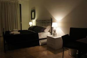 Łóżko lub łóżka w pokoju w obiekcie B&B Civico 40