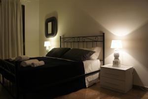 Łóżko lub łóżka w pokoju w obiekcie B&B Civico 40