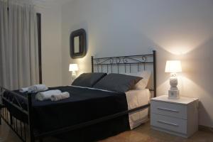 Łóżko lub łóżka w pokoju w obiekcie B&B Civico 40