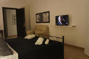 Telewizja i/lub zestaw kina domowego w obiekcie B&B Civico 40