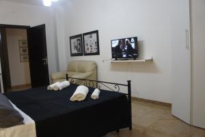 Telewizja i/lub zestaw kina domowego w obiekcie B&B Civico 40