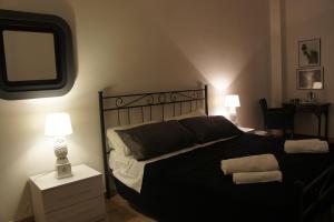 Łóżko lub łóżka w pokoju w obiekcie B&B Civico 40