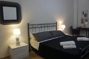 Łóżko lub łóżka w pokoju w obiekcie B&B Civico 40