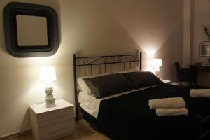 Łóżko lub łóżka w pokoju w obiekcie B&B Civico 40