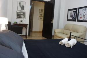 Łóżko lub łóżka w pokoju w obiekcie B&B Civico 40