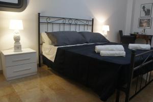 Łóżko lub łóżka w pokoju w obiekcie B&B Civico 40