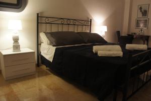 Łóżko lub łóżka w pokoju w obiekcie B&B Civico 40
