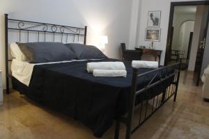 Łóżko lub łóżka w pokoju w obiekcie B&B Civico 40