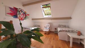 Posezení v ubytování Gîte des Bruyères à Coye-la-Forêt