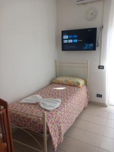 Postel nebo postele na pokoji v ubytování Antica Puglia 2 + 3 fotografie