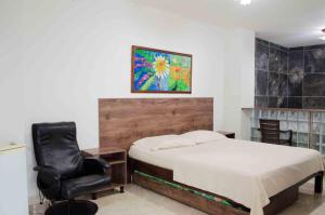 Postel nebo postele na pokoji v ubytování Hotel Elimar