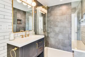 a bathroom with a sink and a mirror at 3-Acre Oceanfront Home Game Room and Fire Pit! in Warrenton +23 photos