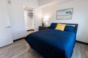 Ένα ή περισσότερα κρεβάτια σε δωμάτιο στο The Well #303 +37 φωτογραφίες