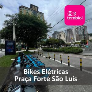 a row of bicycles parked in a parking lot at H70-Hostel 70 FLORIPA in Florianópolis