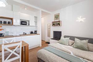 Η κουζίνα ή μικρή κουζίνα στο MW 3A Apartamenty