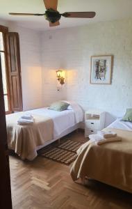 Ένα ή περισσότερα κρεβάτια σε δωμάτιο στο Espectacular Casa de Campo en Areco +61 φωτογραφίες