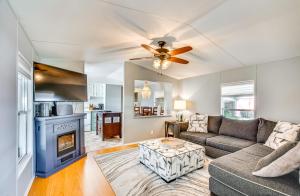a living room with a couch and a fireplace at 27 Mi to The Villages Lush Home with Outdoor Space! in Bushnell