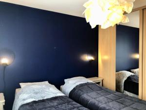 Postel nebo postele na pokoji v ubytování Résidence La Lorena - LA BAULE COEUR DE VILLE MAE-2491