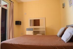 Postel nebo postele na pokoji v ubytování Baywatch Apartment
