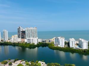 an aerial view of a city with a body of water at Apartamento Marbella Piso 28 - Playa in Cartagena de Indias