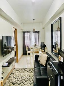 TV a/nebo společenská místnost v ubytování SMDC Shore 3 Residences