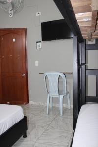 Hotel San Cayetano客房内的一张或多张床位