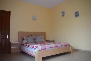 Postel nebo postele na pokoji v ubytování Baywatch Apartment