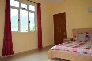 Postel nebo postele na pokoji v ubytování Baywatch Apartment