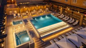 an overhead view of a swimming pool in a building at Eldorado Hotel and Spa in Santa Fe