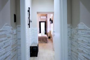 Postel nebo postele na pokoji v ubytování Criba Rooms