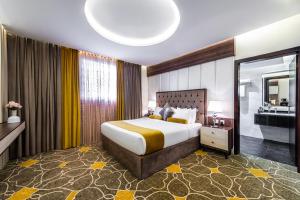 Vuode tai vuoteita majoituspaikassa Ahad Rafidah Garden Millennium Hotel