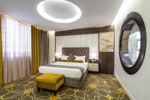 Vuode tai vuoteita majoituspaikassa Ahad Rafidah Garden Millennium Hotel